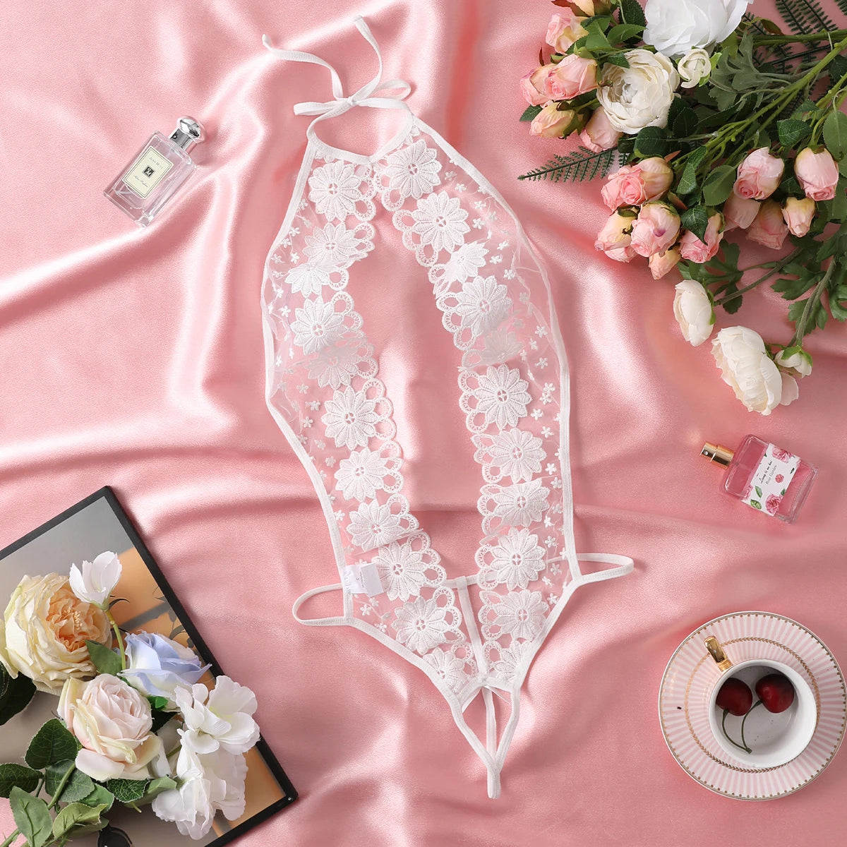 "Flirty White Teddy Bodysuit – Sexy Hollow Floral Lingerie for Adult Nights"