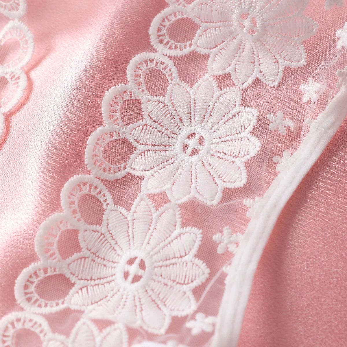 "Flirty White Teddy Bodysuit – Sexy Hollow Floral Lingerie for Adult Nights"