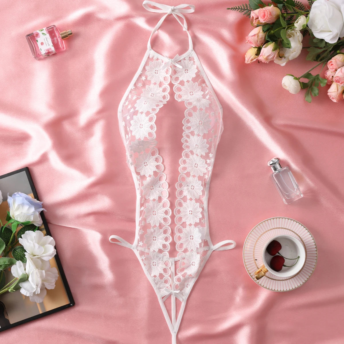 "Flirty White Teddy Bodysuit – Sexy Hollow Floral Lingerie for Adult Nights"